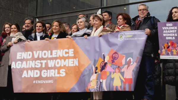 Image of MEPs holding banner that says End violence against women and girls