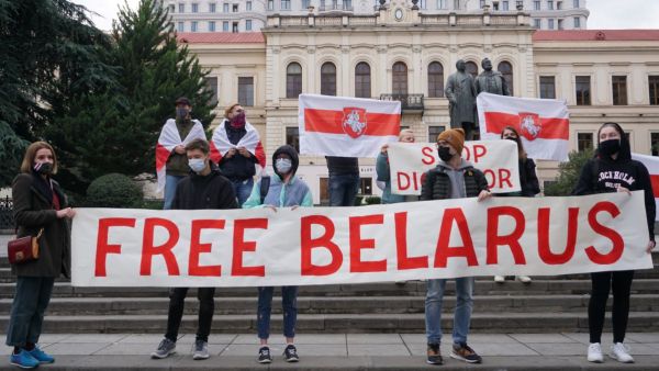 free Belarus protestors with banner