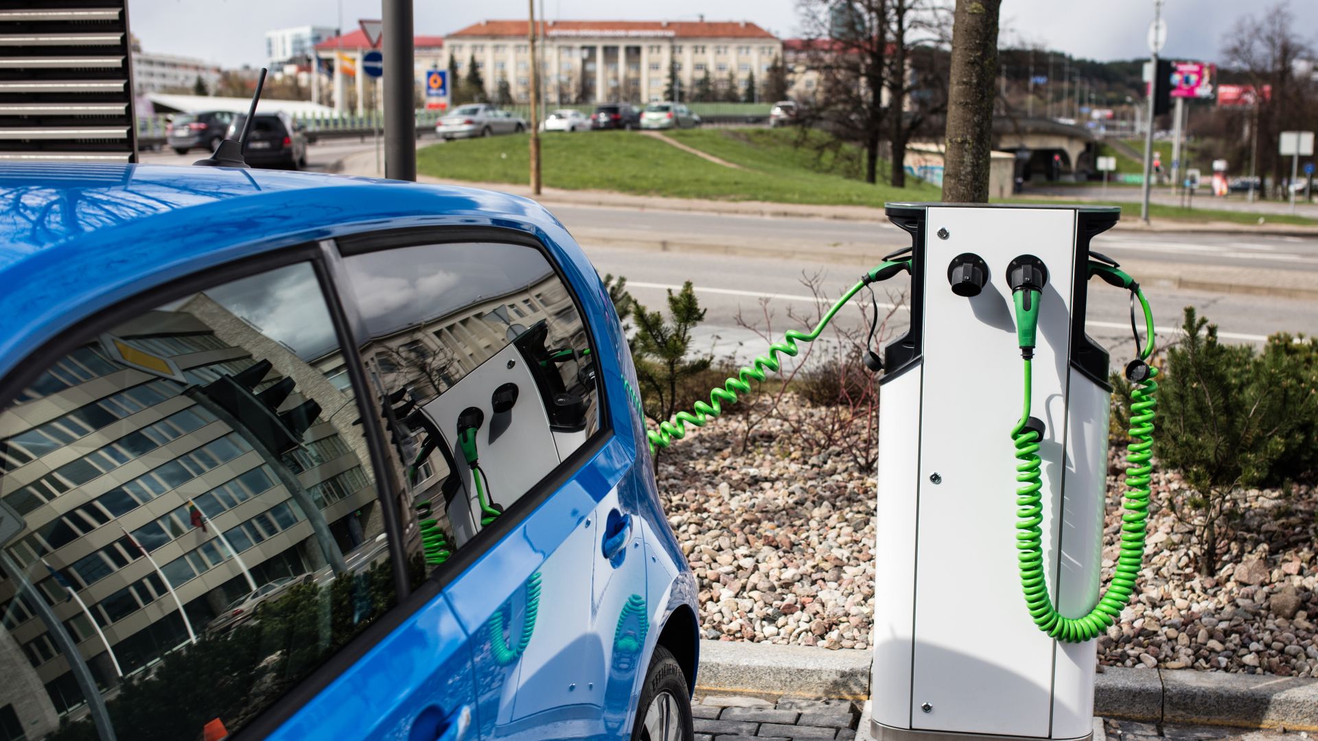 Electric car recharging at a public charging station