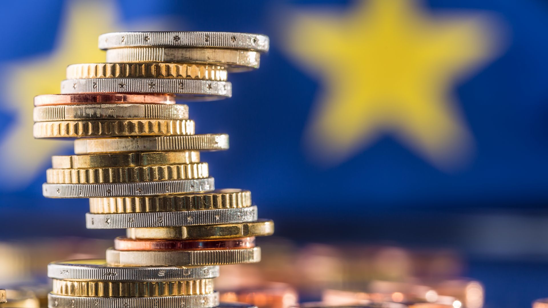 eu coins on eu flag cohesion funds
