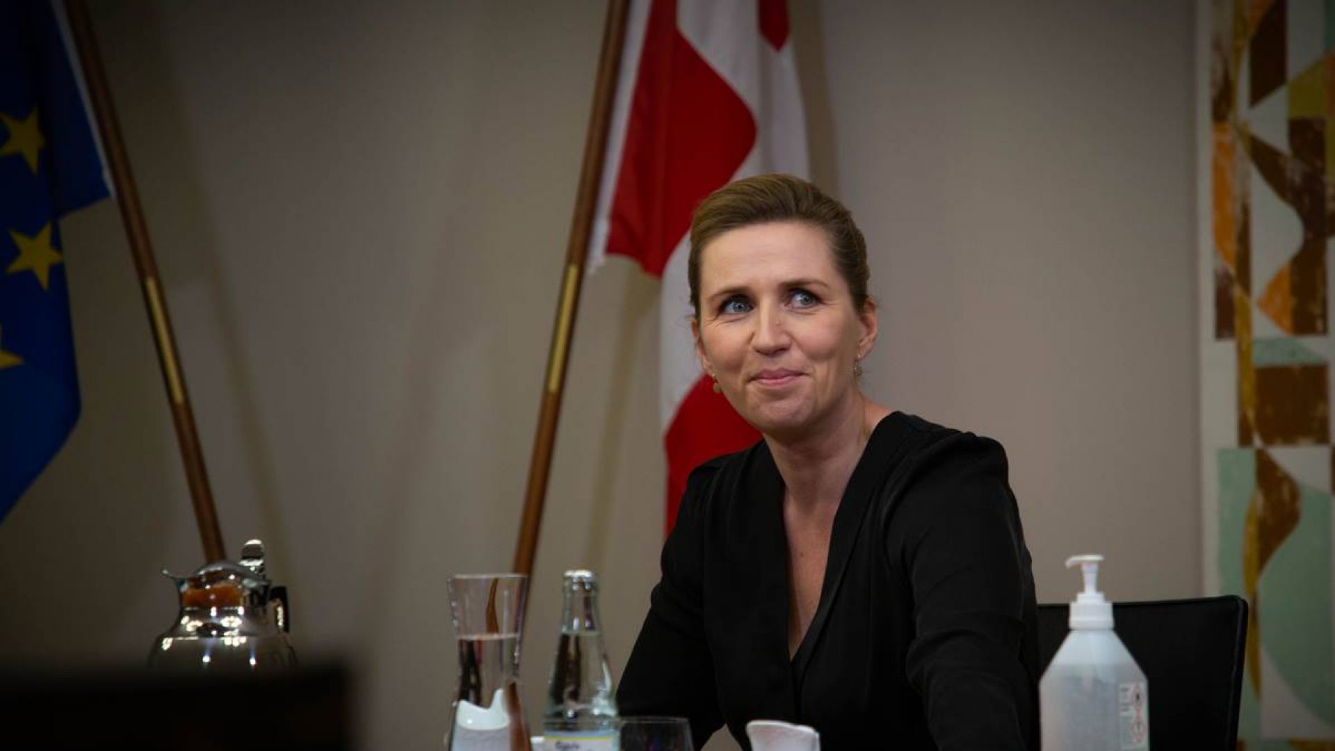 Mette Frederiksen seated at a European Council