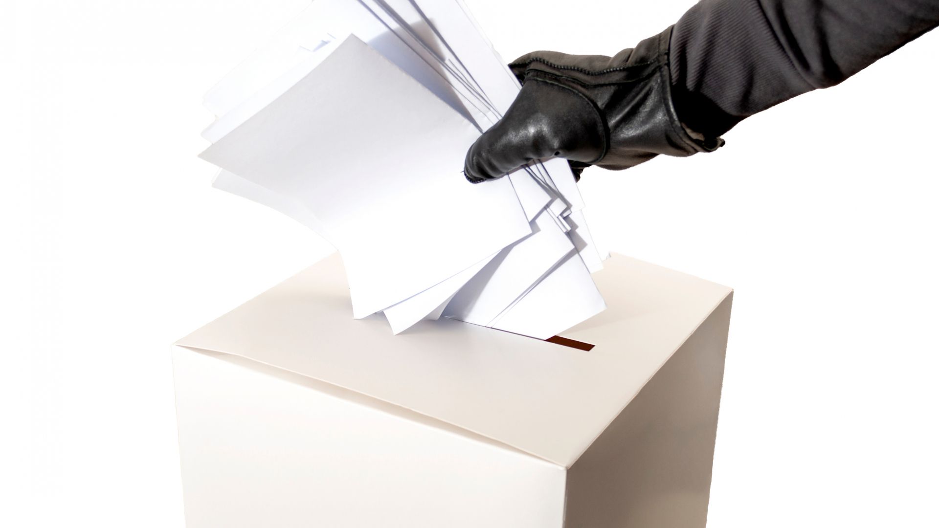 Electoral interference - ballot box and gloved hand