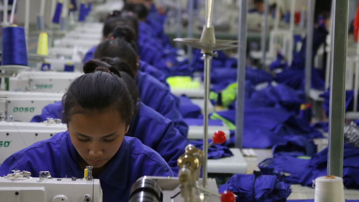 Uyghur women working in a cloth factory in Hotan county, Xinjiang province, China
