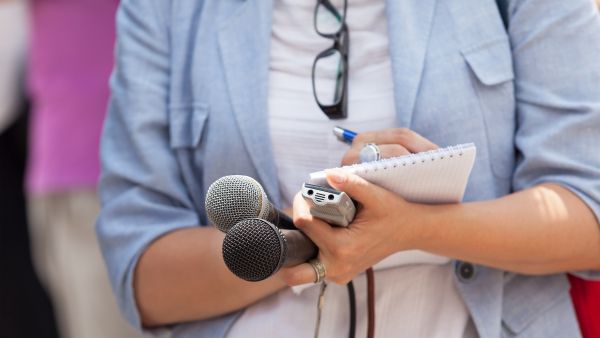 Journalist taking notes