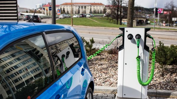 Electric car recharging at a public charging station