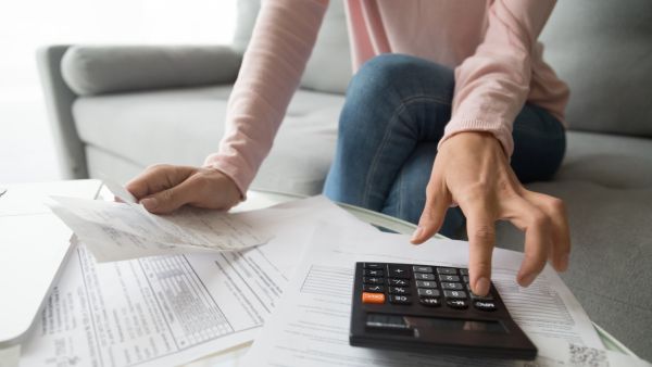 Woman calculating bills