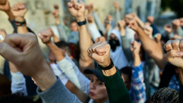 global human rights hand in air protest