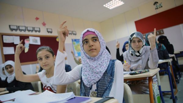 Syrian girls studying at a refugee camp in Kilis, Turkey