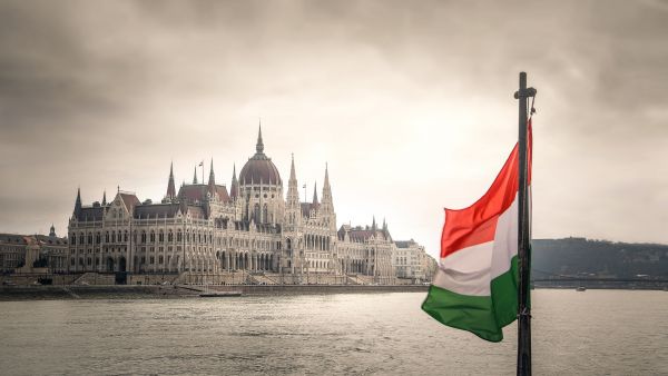 budapest hungary parliament and flag