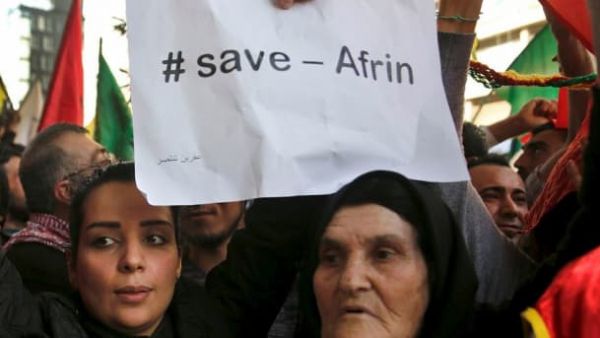 Kurds in road with #save Afrin poster