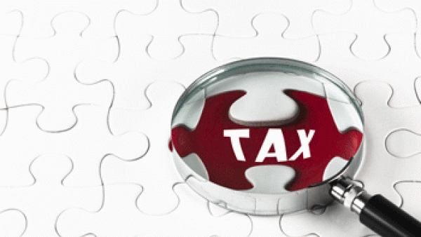 Winning the fight against terrorism and organised crime means winning the fight for financial transparency, MEPs Ana Gomes and Peter Simon, anti-money laundering directive, Panama Papers, terrorist groups, tax, Magnifying glass over TAX on a puzzle
