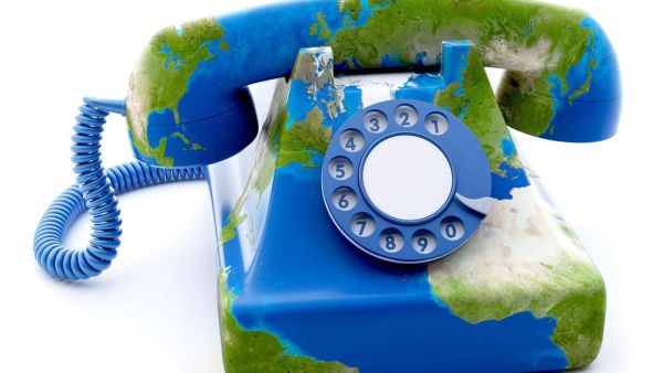 Phone calls from one EU country to another should cost almost the same as a national call, say S&Ds, roaming charges, digitalunion, Miapetra Kumpula-Natri MEP, Marlene Mizzi MEP, Old fashioned phone with world map on it