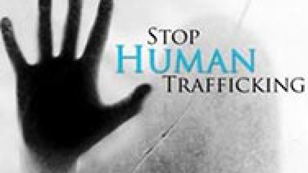 Hand over  words stop human trafficking