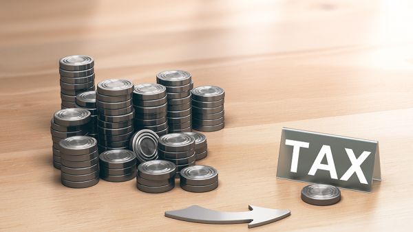 Tax and coins on a table