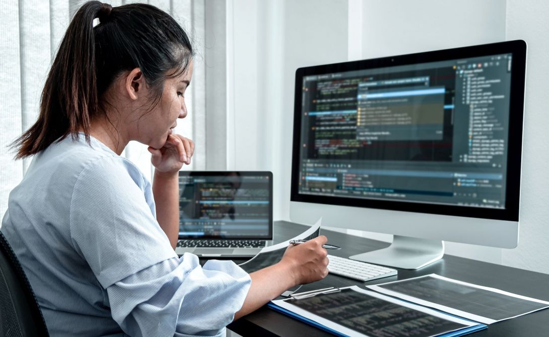 Image of woman coding